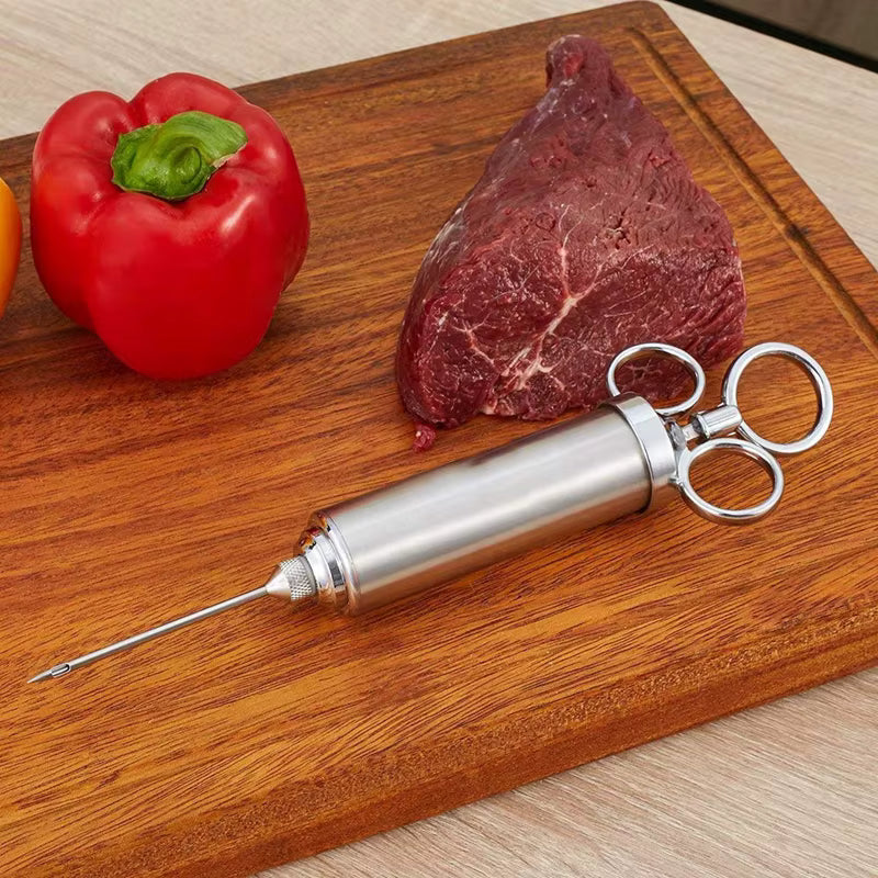 Siringa in acciaio per carni - Centro Internazionale del Barbecue