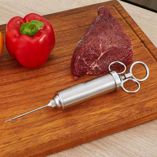 Siringa in acciaio per carni - Centro Internazionale del Barbecue